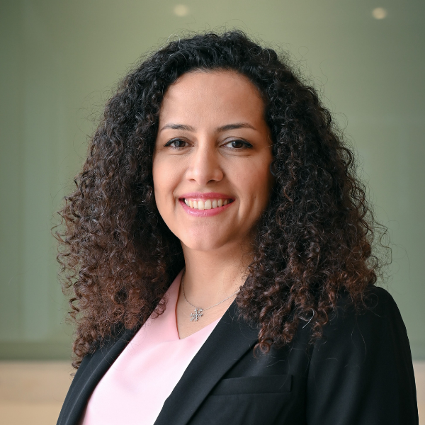Rezvan Eftekhary smiles at the camera.