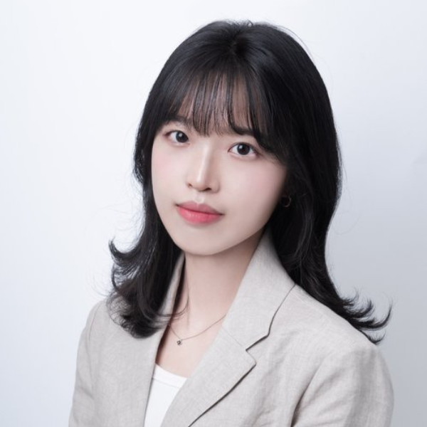 Jiwoo Jung smiles at the camera