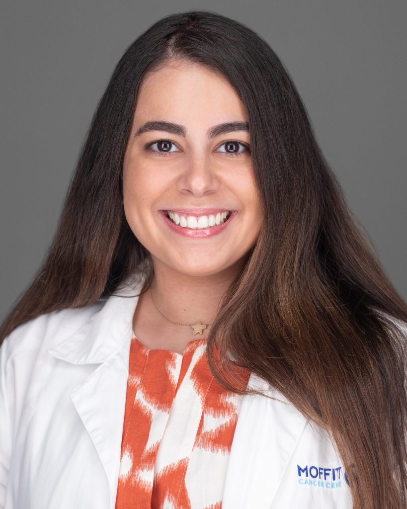 Isis smiles at the camera